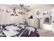 Comfortable bedroom showcasing a inviting bed, dresser, and personal decor at 11234 W Roma Ave, Phoenix, AZ 85037