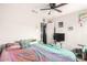 Well-lit bedroom featuring a bed, dresser, and a cozy atmosphere at 11234 W Roma Ave, Phoenix, AZ 85037