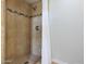 A stylish shower includes updated fixtures and mosaic tile at 13035 N 34Th St # 7, Phoenix, AZ 85032