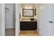 A luxurious bathroom with a decorative granite countertop and modern fixtures at 13035 N 34Th St # 7, Phoenix, AZ 85032