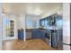 Updated kitchen featuring stainless steel appliances, granite countertops, and plenty of natural light at 13035 N 34Th St # 7, Phoenix, AZ 85032