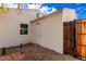 Fenced backyard with a covered patio at 1522 W Glenrosa Ave, Phoenix, AZ 85016