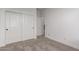 A bedroom with a wall of closets offers organized storage and easy access at 15610 S 181St Dr, Goodyear, AZ 85338