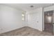 Bedroom featuring sliding door closet, neutral carpet, white walls and one window for natural light at 15610 S 181St Dr, Goodyear, AZ 85338