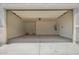 Spacious garage with high ceilings and ample storage space and back door access at 15610 S 181St Dr, Goodyear, AZ 85338