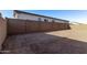 Large backyard with potential for customization and outdoor activities at 15846 W Bronco Trl, Surprise, AZ 85387