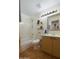 A clean bathroom with a bathtub, and a single sink vanity cabinet at 16424 N 1St Dr, Phoenix, AZ 85023