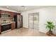 Well-equipped kitchen featuring stainless steel appliances, tile flooring, and access to the backyard at 16833 N 17Th Pl, Phoenix, AZ 85022