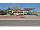 Inviting home with covered parking, desert landscaping and charming curb appeal at 17244 N 66Th Ln, Glendale, AZ 85308
