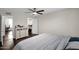 Bedroom with a dresser, a walk-in closet and hardwood floors at 17631 N 42Nd Dr, Glendale, AZ 85308