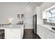 Beautiful kitchen featuring white cabinets, stainless steel appliances and ample counter space at 17631 N 42Nd Dr, Glendale, AZ 85308