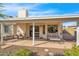Relaxing patio with seating area overlooking the backyard at 17631 N 42Nd Dr, Glendale, AZ 85308