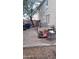 Cemented area in backyard showing clutter and debris at 18293 W Elm St, Surprise, AZ 85388