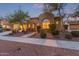 Inviting single-Gathering home with a landscaped front yard and a paved walkway leading to the entrance at 21008 W Cora Vis, Buckeye, AZ 85396