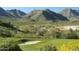 Scenic golf course with desert landscape and mountain views at 21008 W Cora Vis, Buckeye, AZ 85396