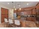 Spacious kitchen featuring an island, stainless steel appliances, and ample cabinet space at 21008 W Cora Vis, Buckeye, AZ 85396