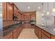 Well-appointed kitchen with granite countertops, stainless steel appliances, and mosaic backsplash at 21008 W Cora Vis, Buckeye, AZ 85396