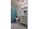 Bathroom features a white vanity and tub with a patterned shower curtain at 2143 N 30Th St, Mesa, AZ 85213