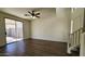 Bright living room with ceiling fan and sliding glass door leading to backyard at 2143 N 30Th St, Mesa, AZ 85213