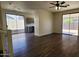 Living room with sliding glass doors leading to the back yard and an open floorplan at 2143 N 30Th St, Mesa, AZ 85213