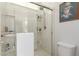 Modern bathroom showcasing a glass-enclosed shower with built-in shelving at 22552 E Via Estancia --, Queen Creek, AZ 85142