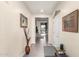 Bright entryway with tile flooring, decorative accents, and a view through to the secure front door at 22552 E Via Estancia --, Queen Creek, AZ 85142