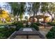 Park with chess tables and seating areas at 22552 E Via Estancia --, Queen Creek, AZ 85142