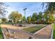Community park featuring bocce ball courts, benches, and landscaped areas for residents to enjoy at 22552 E Via Estancia --, Queen Creek, AZ 85142