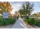 Scenic park path with manicured landscaping and walking trails at 22552 E Via Estancia --, Queen Creek, AZ 85142