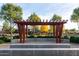 A stage with a pergola in a lush park setting at 22552 E Via Estancia --, Queen Creek, AZ 85142
