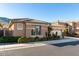Inviting home with desert landscaping, tile roof, and two-car garage at 2325 W Mineral Rd, Phoenix, AZ 85041