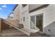 A well-maintained backyard features gravel landscaping and a sliding glass door for indoor-outdoor living at 2825 W Eagle Talon Rd, Phoenix, AZ 85085
