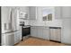 Contemporary kitchen features stainless steel appliances, white countertops, and ample cabinetry, ideal for cooking at 2825 W Eagle Talon Rd, Phoenix, AZ 85085