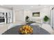 Inviting living space featuring a well-equipped kitchen, comfortable seating, and an open-concept layout for modern living at 2832 W Eagle Talon Rd, Phoenix, AZ 85085