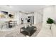 Open-concept space with a well-equipped kitchen, dining area, and living room, perfect for seamless entertaining and relaxation at 2832 W Eagle Talon Rd, Phoenix, AZ 85085