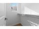 Well-lit walk-in closet with ample shelving and natural light for easy organization at 2832 W Eagle Talon Rd, Phoenix, AZ 85085