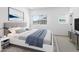 Inviting bedroom with comfortable bedding, neutral decor, and ample natural light at 2835 W Eagle Talon Rd, Phoenix, AZ 85085