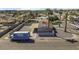 The aerial view shows a fenced in backyard and a large moving truck outside the property at 2921 W Luke Ave, Phoenix, AZ 85017