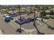 A corner lot featuring a well-maintained home with gravel landscaping and palm trees at 2921 W Luke Ave, Phoenix, AZ 85017