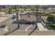 Aerial view of the well-maintained home showcases the gravel landscaping and neighboring houses at 2921 W Luke Ave, Phoenix, AZ 85017