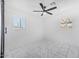 Bright bedroom with a ceiling fan and dual windows providing natural light at 2921 W Luke Ave, Phoenix, AZ 85017