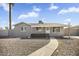 Charming single-story home features a low maintenance front yard and welcoming entrance walkway at 2921 W Luke Ave, Phoenix, AZ 85017