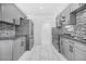 Updated kitchen featuring stainless steel appliances, gray cabinetry and decorative backsplash at 2921 W Luke Ave, Phoenix, AZ 85017