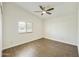 This bedroom has tiled floors and natural light from the window at 33810 N Smokehouse Trl, Cave Creek, AZ 85331