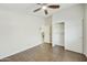Bright bedroom with closet, ceiling fan and tiled floors at 33810 N Smokehouse Trl, Cave Creek, AZ 85331