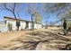 Charming home with terracotta roof, desert landscaping and mature trees at 33810 N Smokehouse Trl, Cave Creek, AZ 85331