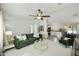 Bright, airy living room featuring stylish decor, comfortable seating, and modern flooring at 33810 N Smokehouse Trl, Cave Creek, AZ 85331