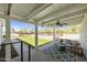 Entertain on this covered patio overlooking a lush, fenced backyard at 33810 N Smokehouse Trl, Cave Creek, AZ 85331