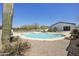 Inviting pool area with desert plants and a view of the home, perfect for hot days at 33810 N Smokehouse Trl, Cave Creek, AZ 85331