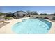 Sparkling pool with rock landscaping and poolside chairs, ideal for relaxation at 33810 N Smokehouse Trl, Cave Creek, AZ 85331